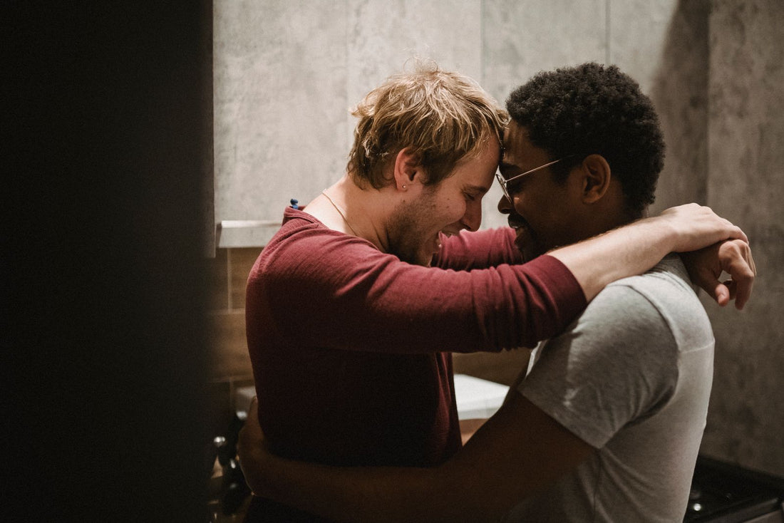 Two men sharing a tender moment together