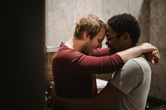 Two men sharing a tender moment together