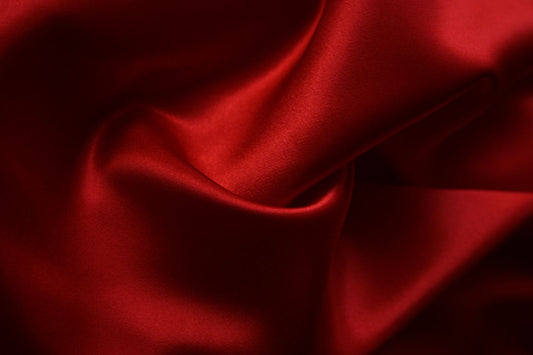 Softly draped red silk fabric